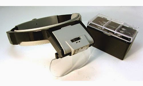 http://lowvisionbooster.com/magnifier/headband-visor-magnifiers/head-magnifier-with-light-best-seller.html