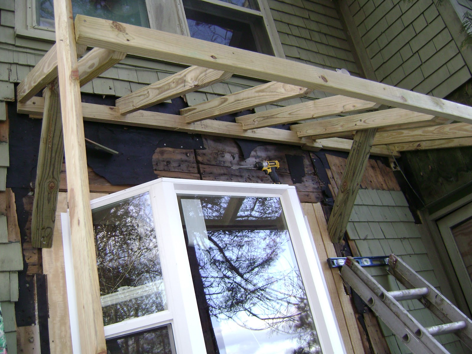 long pond endeavor company: bay window with new shed roof