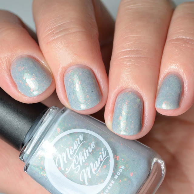 grey nail polish with flakies four finger swatch