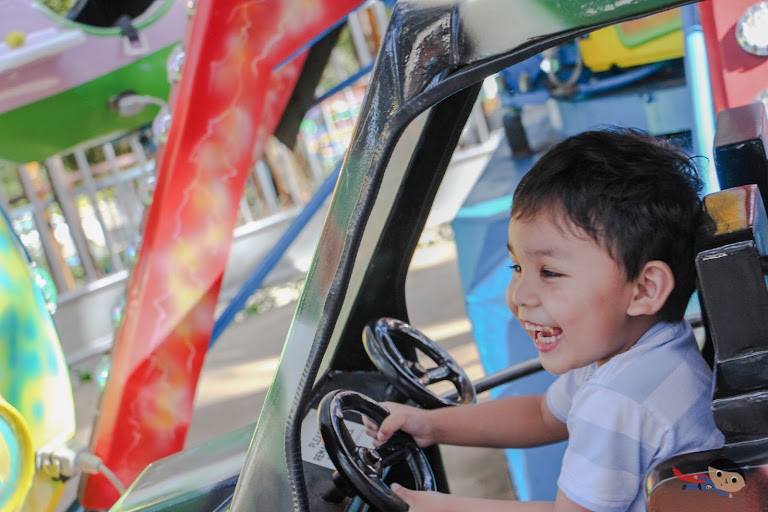 Baby Garrett riding Red Baron in Sky Ranch, Baguio