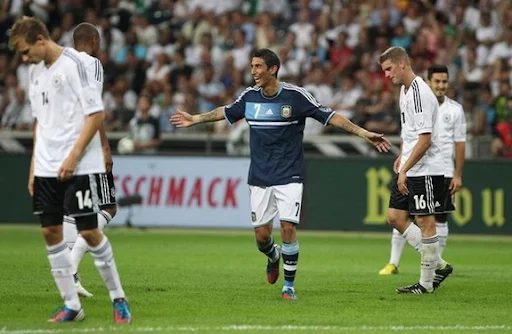 Ángel di María celebrates after scoring Argentina's third goal against Germany