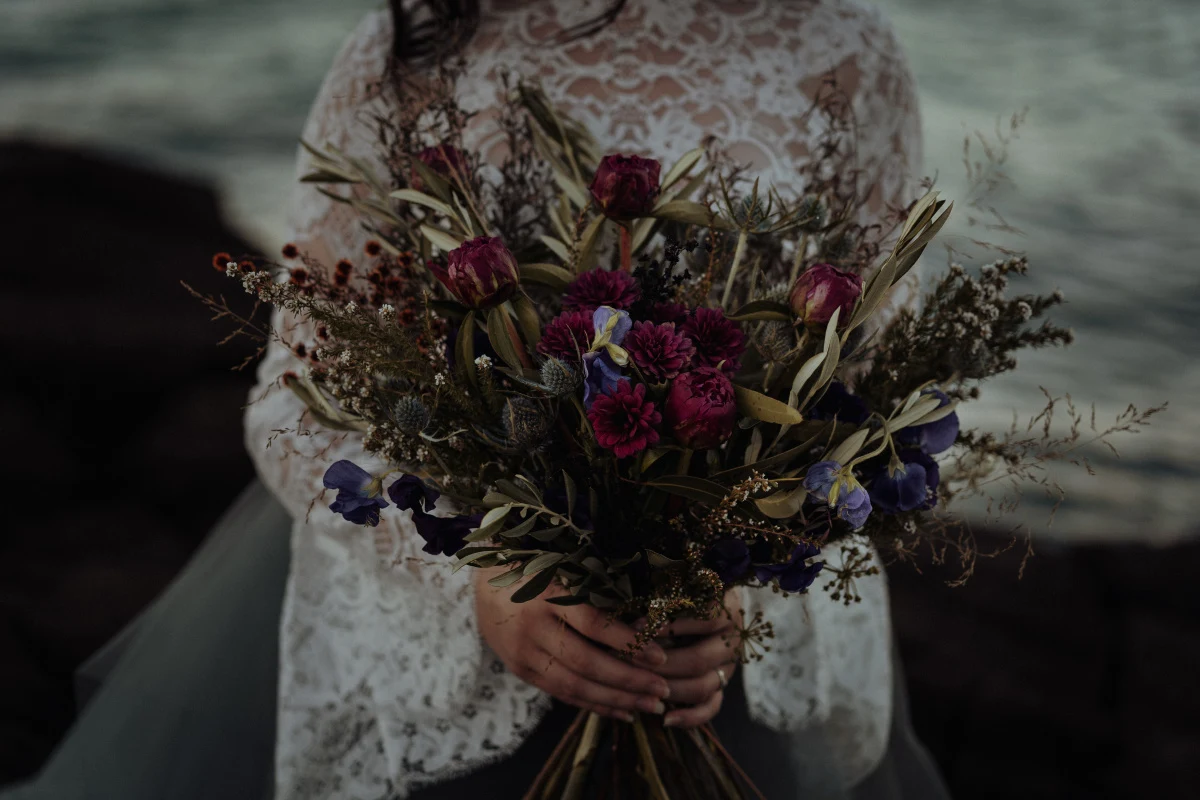 white parrot film and photography beach wedding elopement australian designer dark moody bridal fingal head