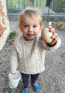 Very happy with the egg she found