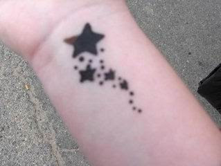 star  tattoos on wrist