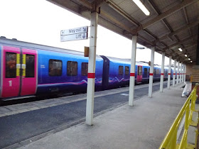 One of the non-stopping trains passing through Ashton-under-Lyne station