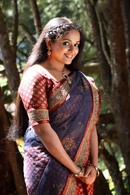 Kavya Madhavan Hot Spicy in Saree Photos