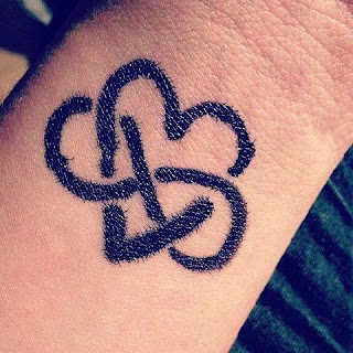 flower heart tattoos