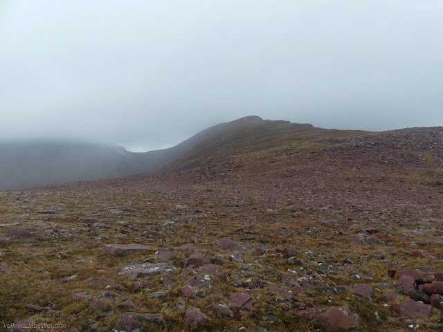 067: flattened area with snow coming down