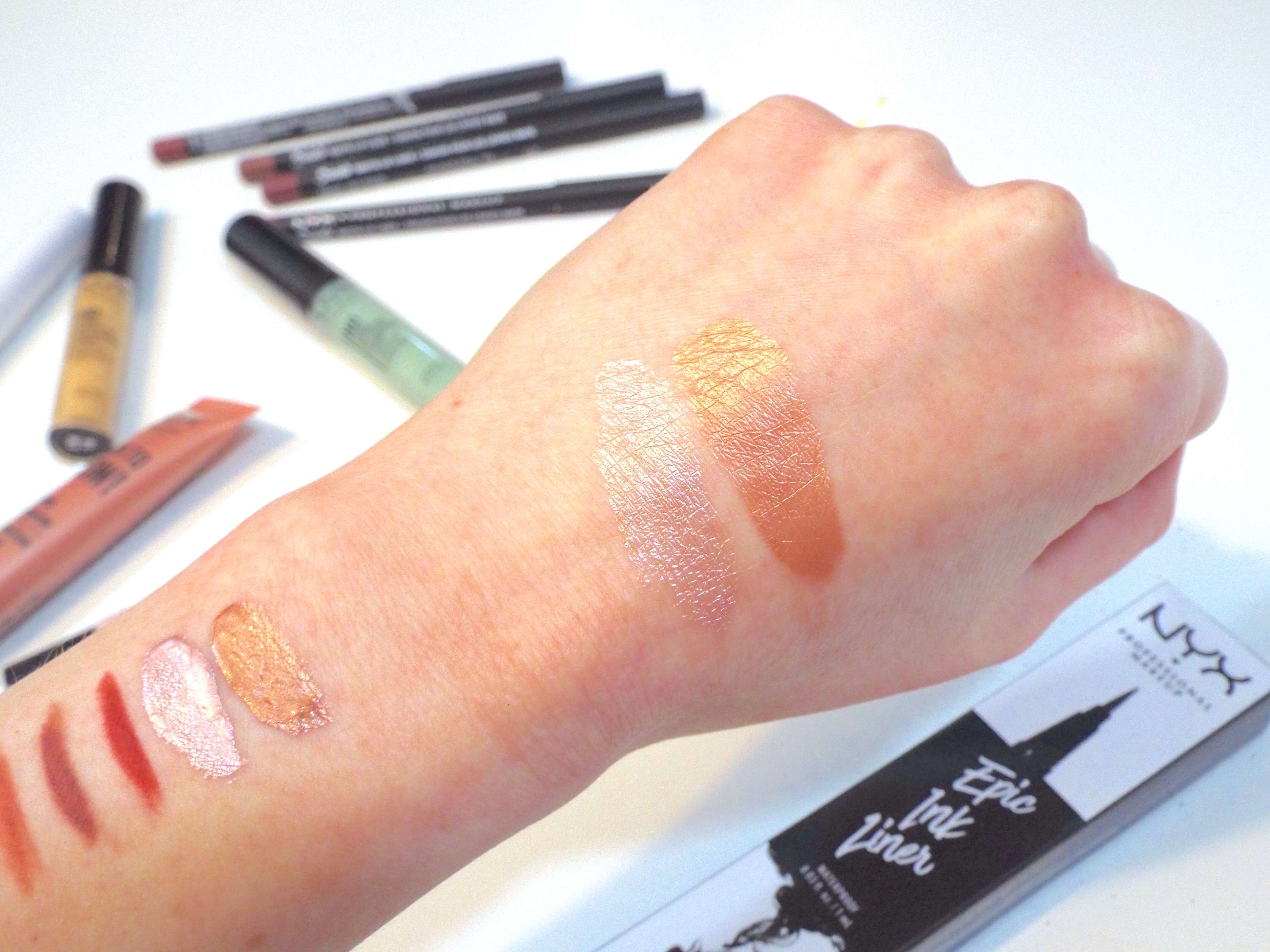 Swatches of the two NYX Born to Glow Liquid Illuminators, in Sunbeam and Gleam, blended out more on the hand, giving a sheerer but still strong pay-off colour.
