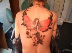 Cute Angel Tattoos,tattoo designs,angel tattoos,tattoos pics,tattoos pictures,pic of tattoos,tattoos designs,angel pictures,tattoo design,tattoo art,angel pics,free tattoos