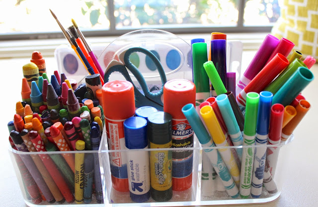 having paints and markers organized