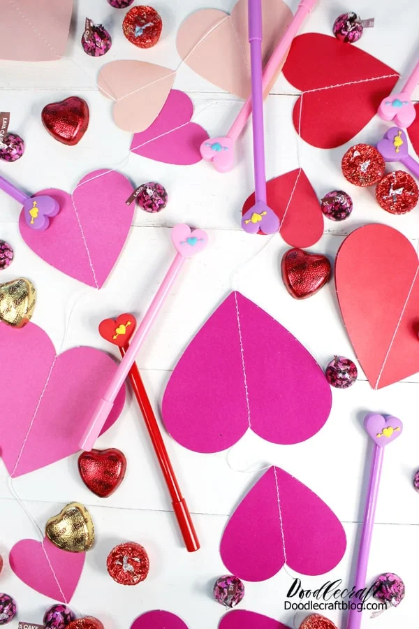 Hearts, candy and heart shaped pens in pinks and reds perfect for Valentine's day!