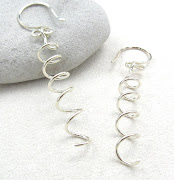 Hand formed from Argentium sterling silver, both the coil and earwires were .