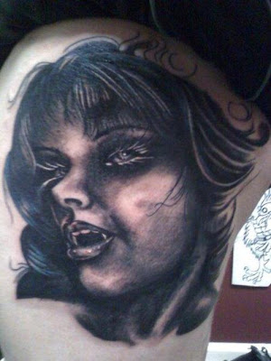 woman tattoo. vampire woman tattoo