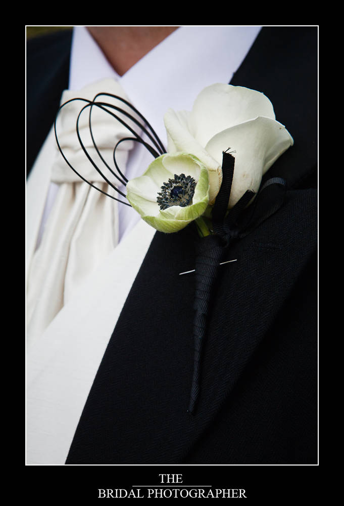 Jonathan's buttonhole matched the brides bouquet and was made with a white