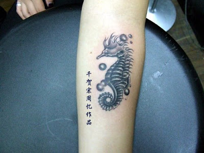 This Is An Elegant Sea Horse Tattoo Design With Several Cute Bubbles