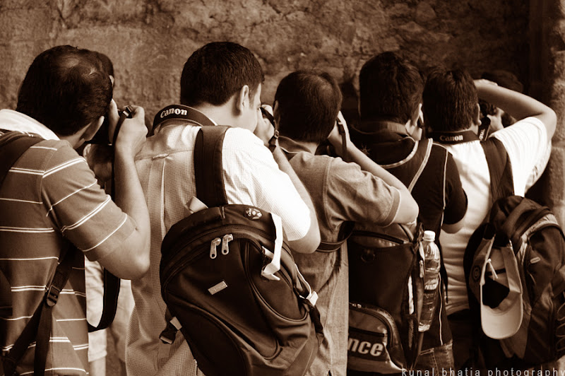 line of photographers in a row in mumbai by kunal bhatia