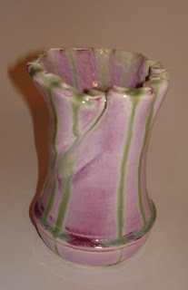 pink-and-green-vase-handmade-ceramic-purchased-from-a-thrift-store