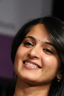 Anushka Shetty Cute Smiley Face Stills Gallery