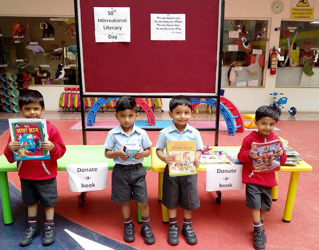 "Donate- a- book" Trio tots celebrated International Literacy Day by gifting books to underprivileged students