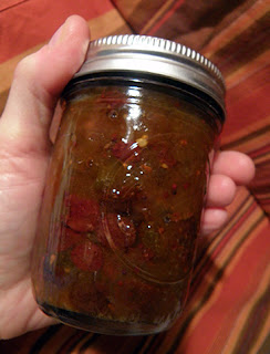 Jar of Chutney in a Hand