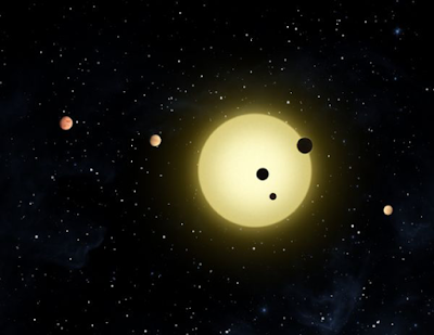 An artist's representation of Kepler-11, a small, cool star around which six planets orbit. Credit: NASA/Tim Pyle