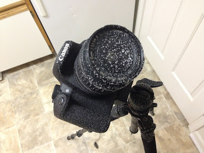 canon camera covered in frost