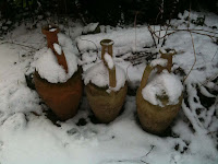 snowy garden pots