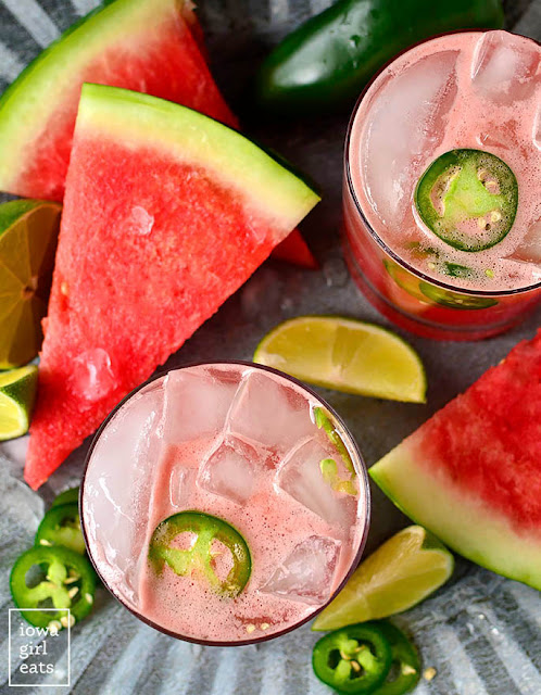 Watermelon Jalapeno Margaritas with slices of fresh watermelon.