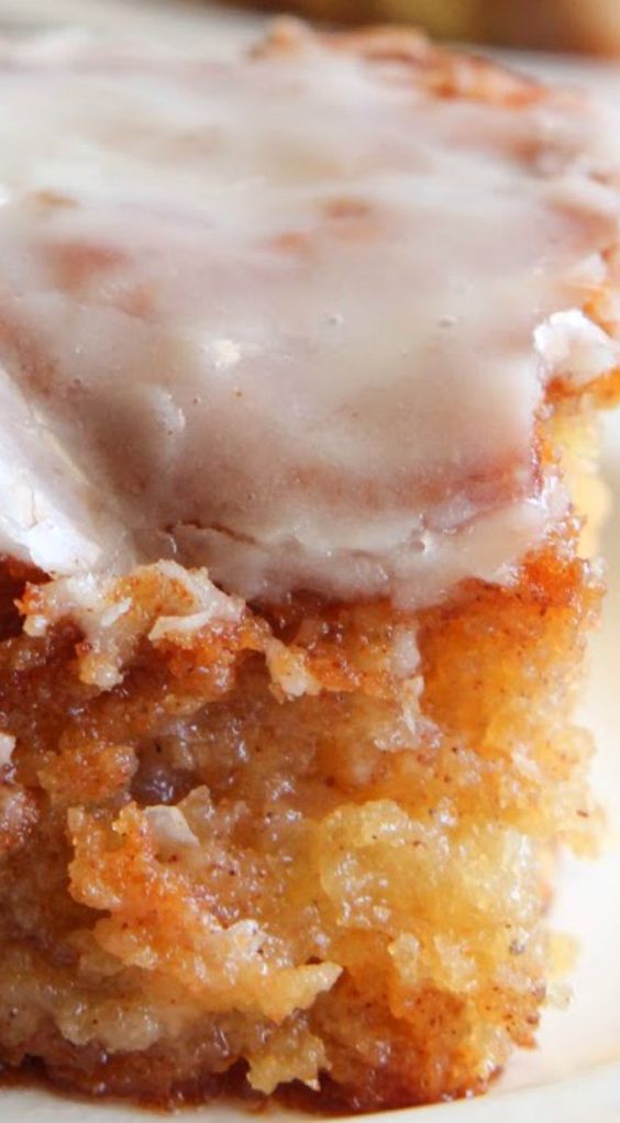 Honeybun Cake ~ A CINNAMON ROLL, but in cake form... Super moist cake, swirled with cinnamon and sugar and a gooey glaze on top.