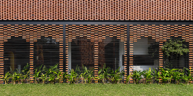 brick and metal combined to create a geometric modern wall