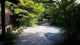 Ladies in Kimono in a japanese garden