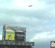 . LaGuardia airport, and a deafening airplane would fly overhead EVERY. (mets )