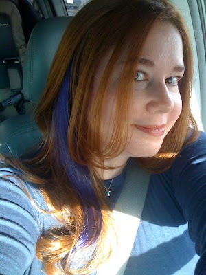 brown hair with purple streaks. Black hair with purple and blue streaks and some coontails. Purple streaks.