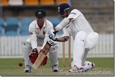 India's Sachin Tendulkar (R) bats during his cricket match against CA Chairman's XI at Manuka oval in Canberra December 16, 2011. REUTERS/Daniel Munoz (AUSTRALIA - Tags: SPORT CRICKET)