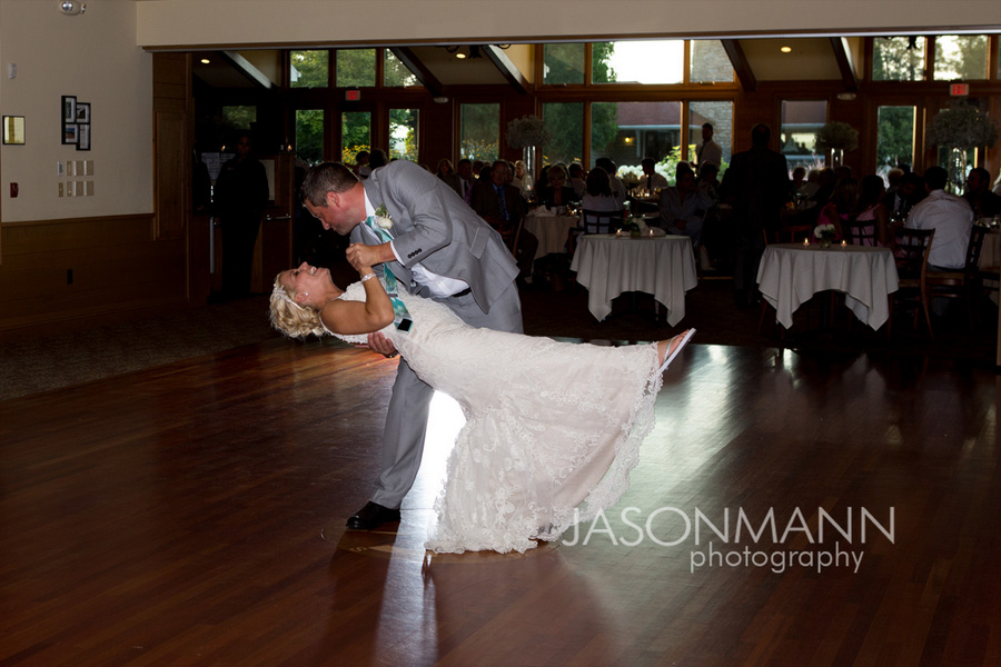 Door County wedding reception at Gordon Lodge, bride and groom dancing, romantic dip. Photo by Jason Mann Photography, 920-246-8106, www.jmannphoto.com