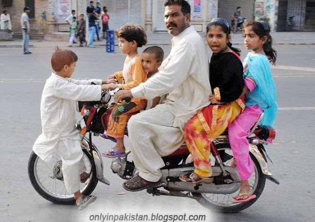 Funny Pakistani motorcyclist with children