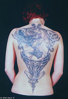 crow tattoo on back body girl