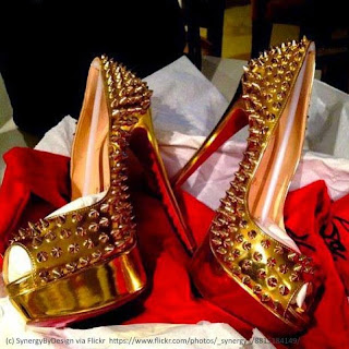 Christian Louboutin gold studded high heels