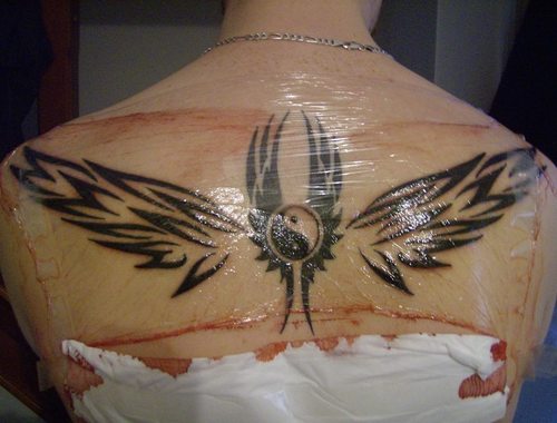 angel wing tattoos on back for men and in demand tattoo designs are the