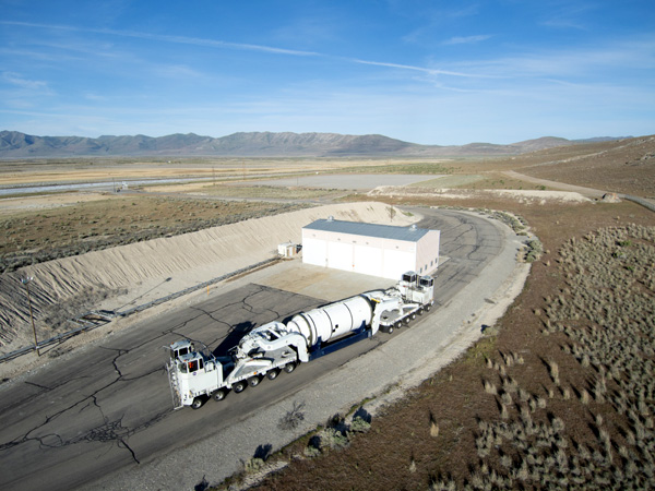 One of 10 solid rocket booster segments that will fly on NASA's Artemis 3 mission undergoes processing at Northrop Grumman's facility in Promontory, Utah.