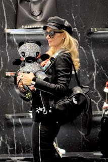 Paris Hilton Shopping in Black Dress at Philipp Plein Boutique in Milan