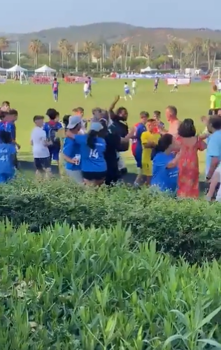 VIDEO: Father tries to stab another dad in shocking scenes at international youth game in Spain