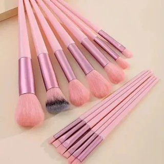 13-piece pink makeup brush set with beauty blender, featuring soft synthetic bristles for seamless makeup application.