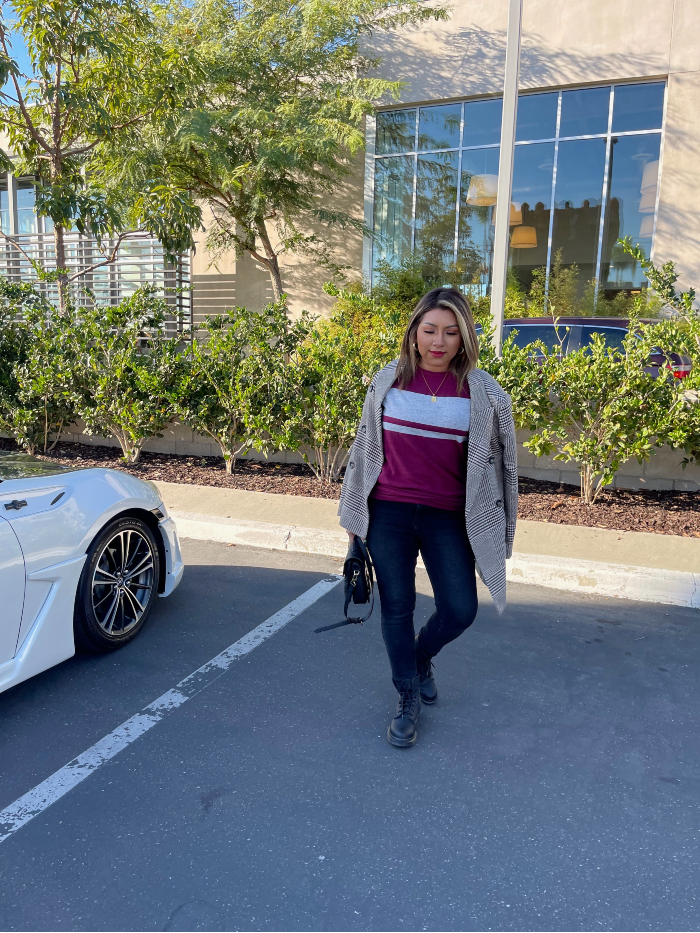 woman wearing a plaid h&m blazer with louis vuitton bag