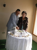 my parents cutting their cake