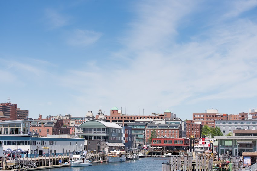 Portland, Maine USA June 2018 photo by Corey Templeton. Part of the Old Port skyline from the approach to the State Pier.