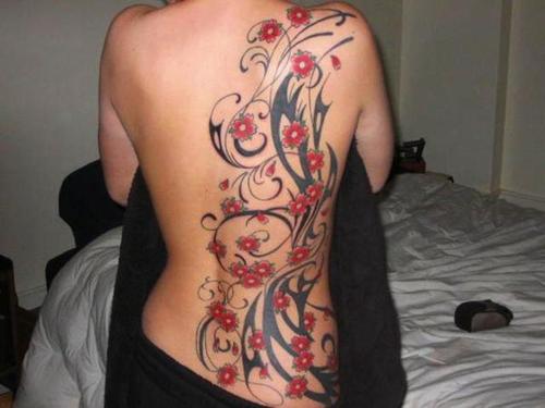 tribal tattoos for women on side. Cherry Blossom Tattoos for girls