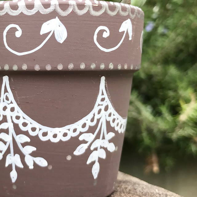 mehndi decorated plant pot