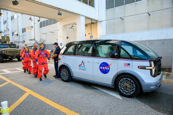 The Artemis 2 astronauts prepare to board their electric-powered crew transportation vehicles to continue their training at Kennedy Space Center's Launch Complex 39B...on September 20, 2023.